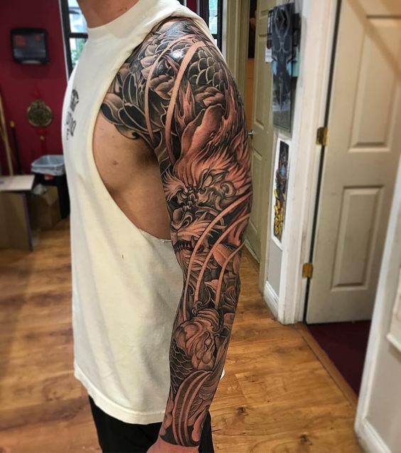 tattoo hình xăm rồng kết hợp cá chép đơn sắc kín tay