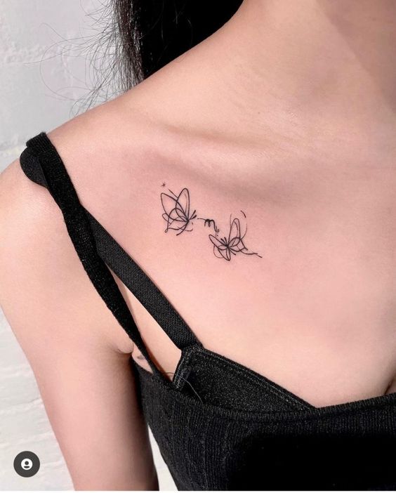 độc đao với mẫu tattoo kết hợp hai ký hiệu của cung bọ cạp