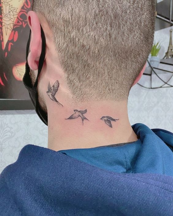 tattoo ba con chim mini sải cánh