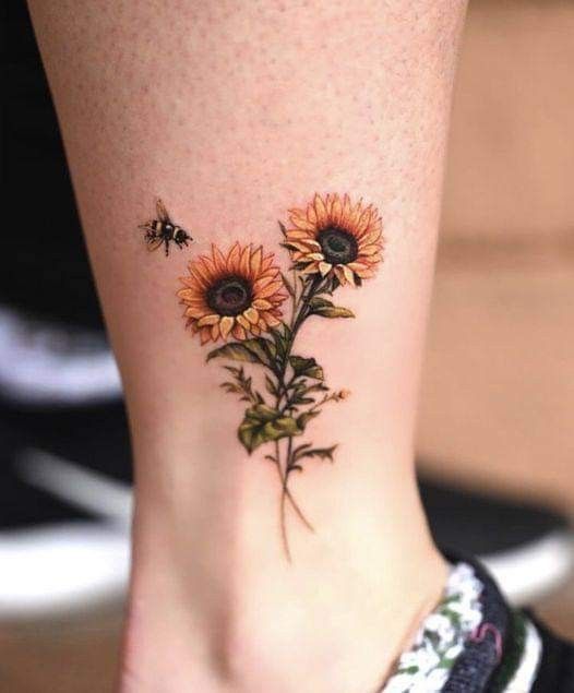 tattoo cành hướng dương ở cổ chân cho nữ