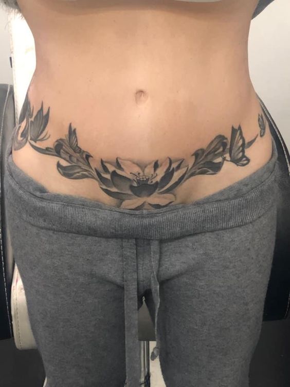 hình xăm che sẹo mổ ở bụng cho nữ