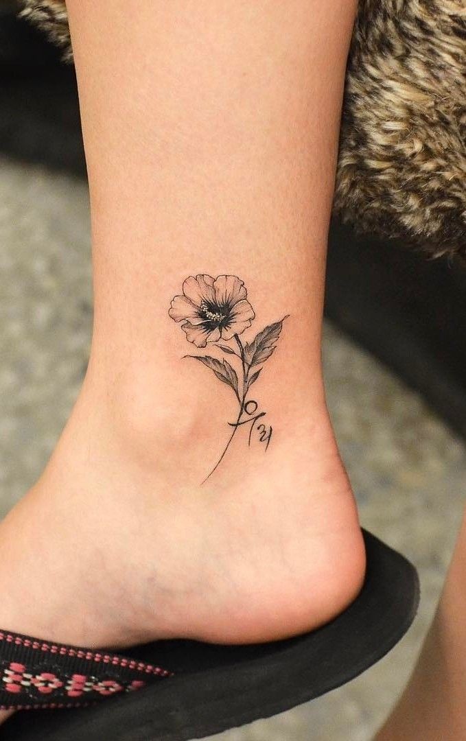 mẫu tattoo cành hoa nhỏ ở mắt cá chân