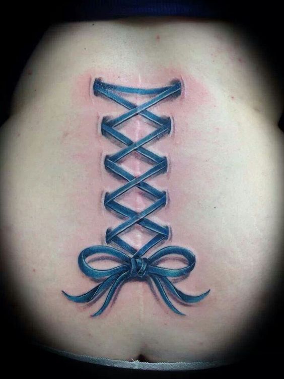 mẫu tattoo che sẹo cho nữ ở bụng