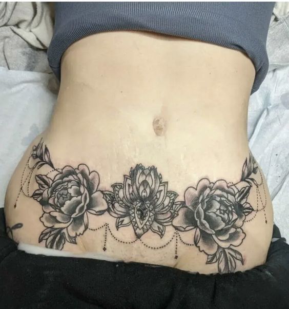 mẫu tattoo che vết rạn bụng cực đẹp