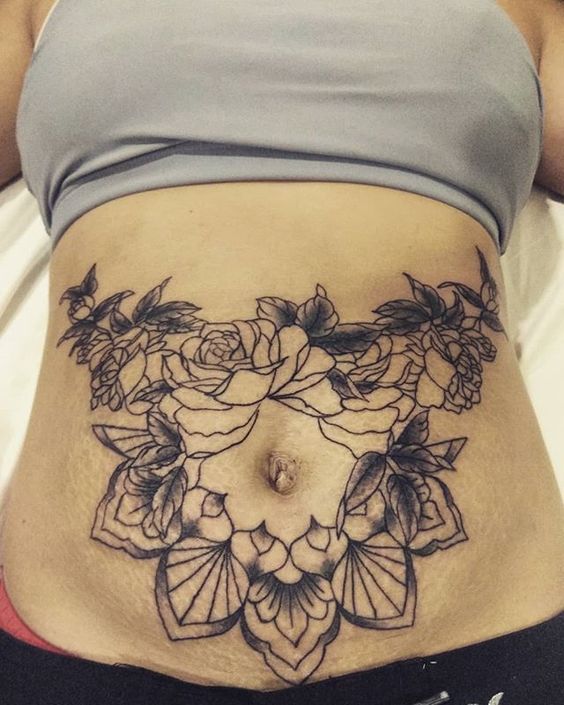 mẫu tattoo che vết rạn bụng