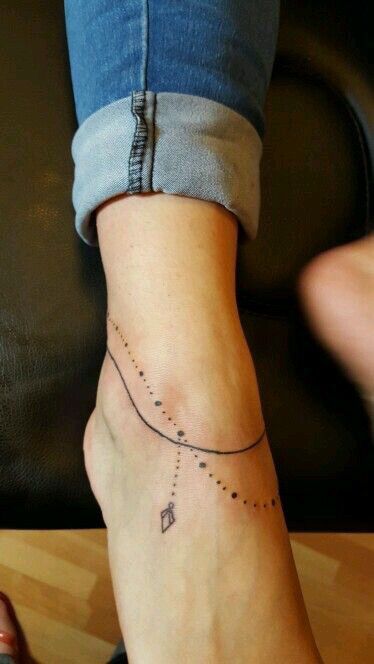 mẫu tattoo rung lắc chân giàn giụa cá tính