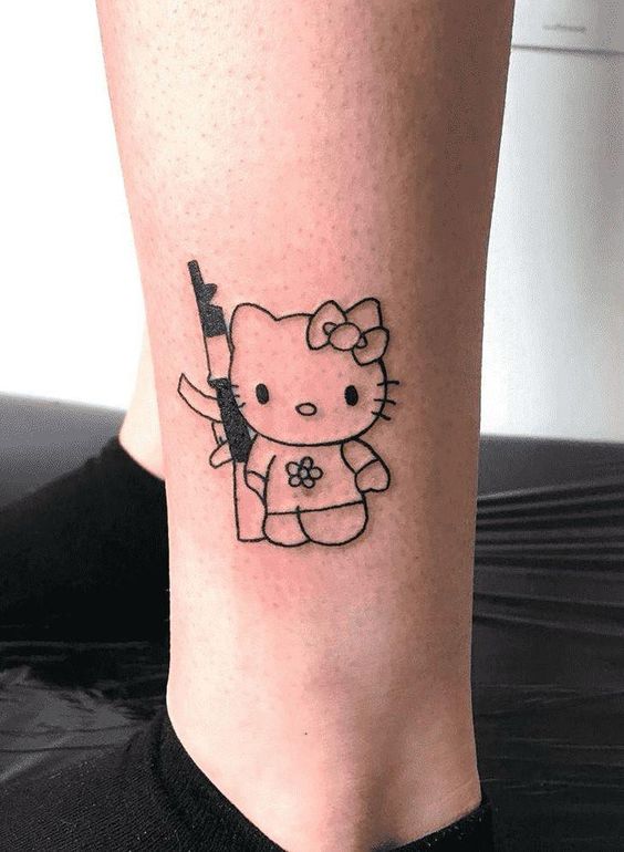 mẫu xăm hello kitty cầm súng cực chiến