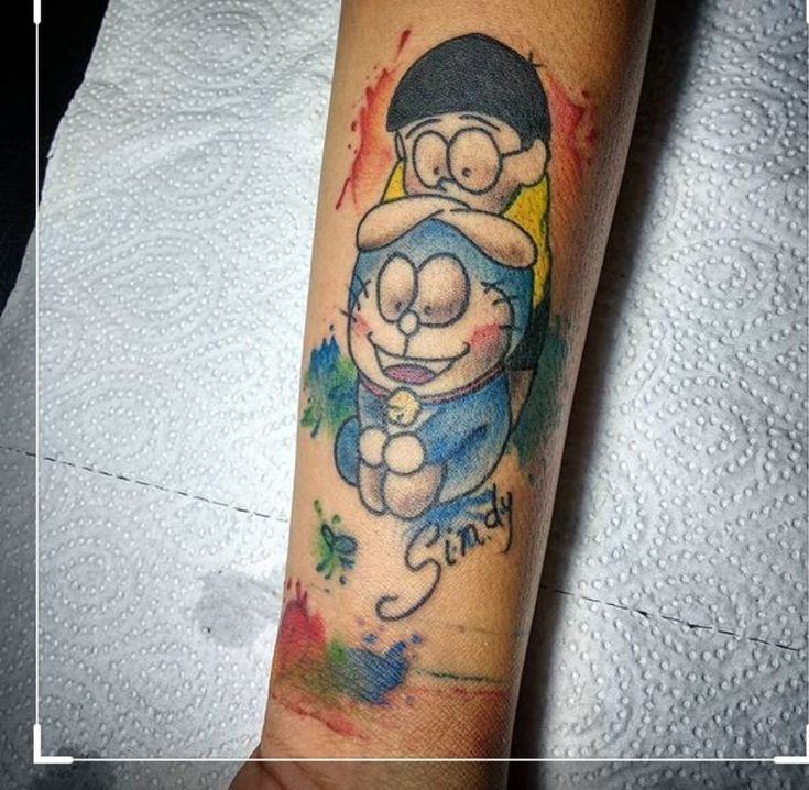 phong cách tattoo sáng tạo về Nobita và Doraemon