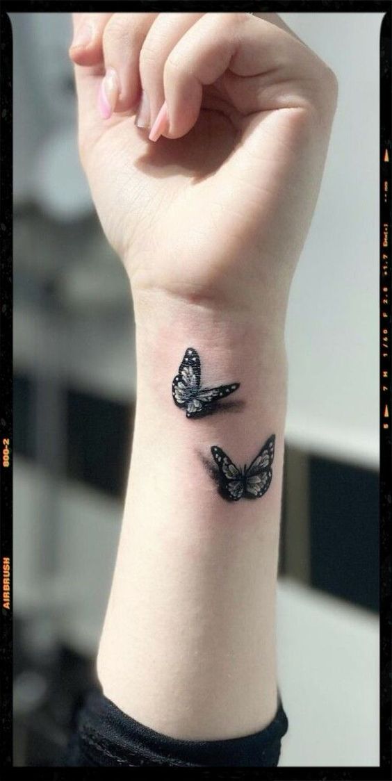 tạo điểm nhấn với cặp tattoo bướm sinh động