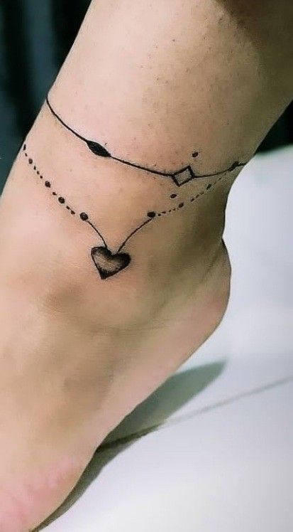 tattoo rung lắc chân hình ngược tim ý nghĩa