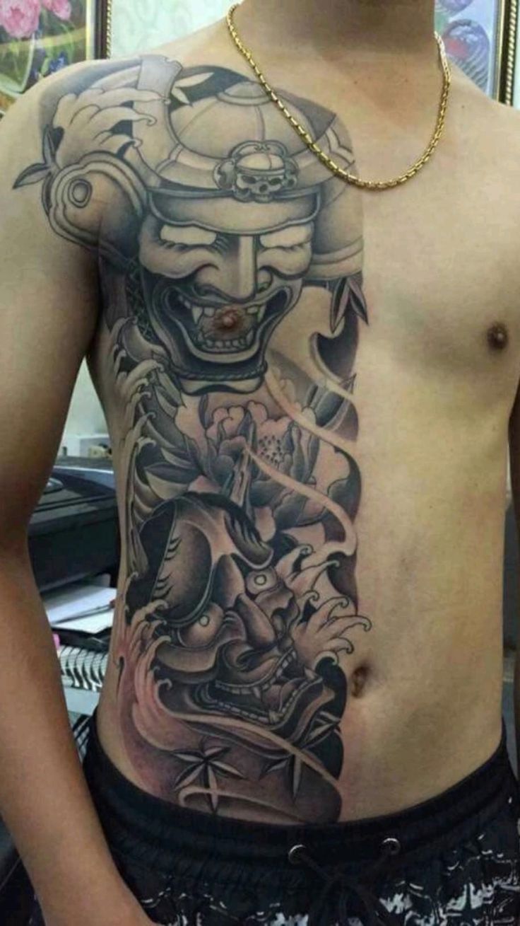 tattoo nửa mình 2 đầu quỷ dữ