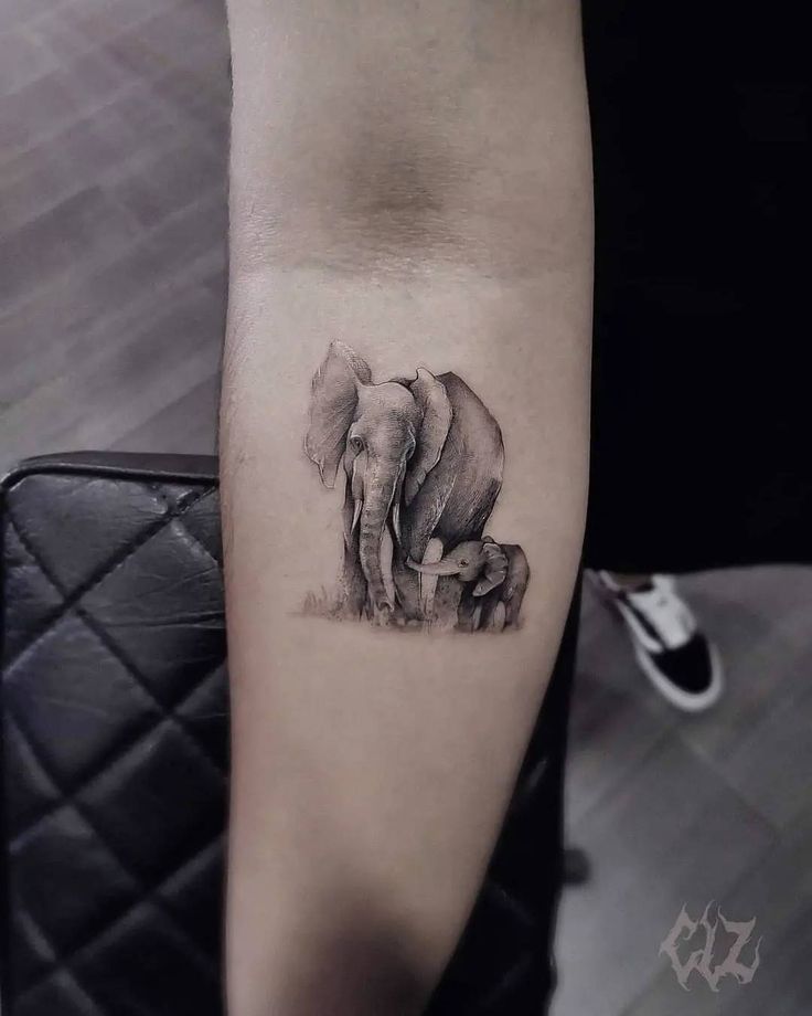 hình tattoo cẳng tay mẫu xăm voi chân thực