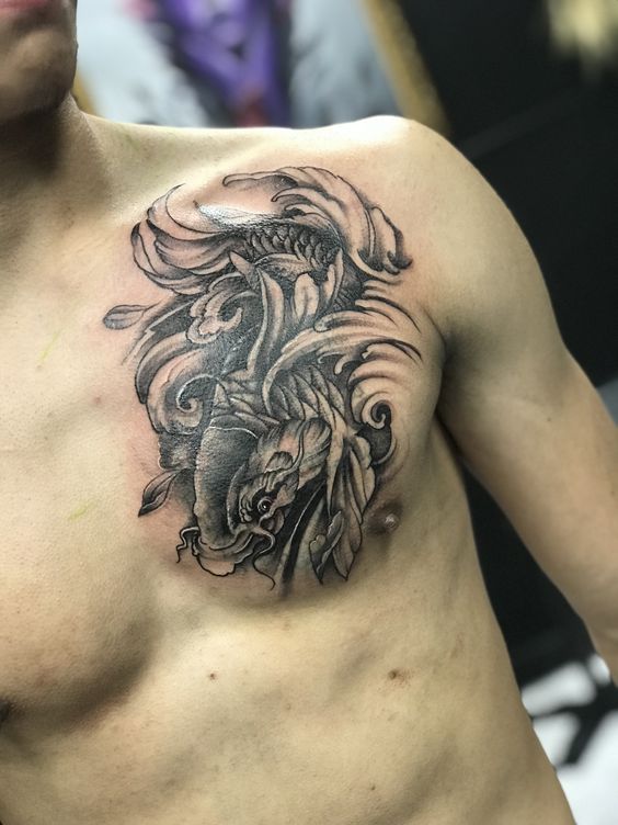 kiểu tattoo cá chép nổi bật trên ngực anh khách