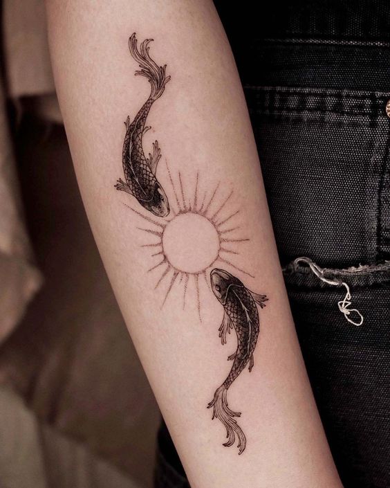 tattoo cẳng tay mẫu cá chép đôi độc đáo