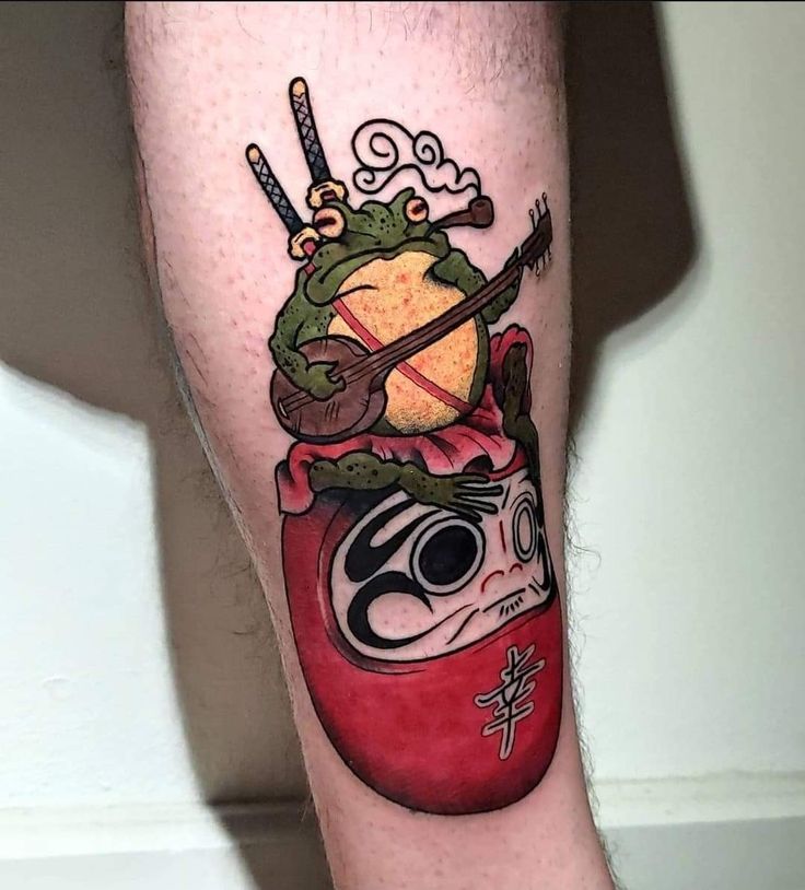 tattoo ếch đang đánh đàn cực chiến