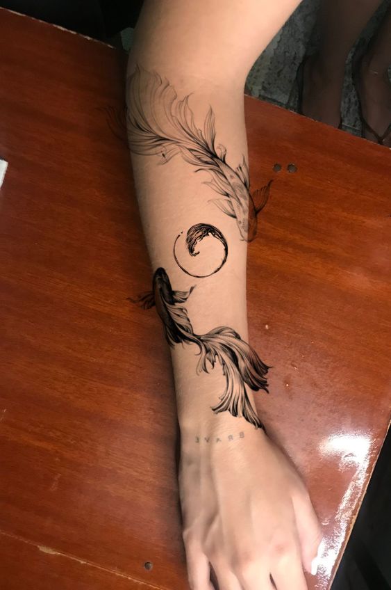 tượng trưng cho sự dư dả với kiểu tattoo cá chép