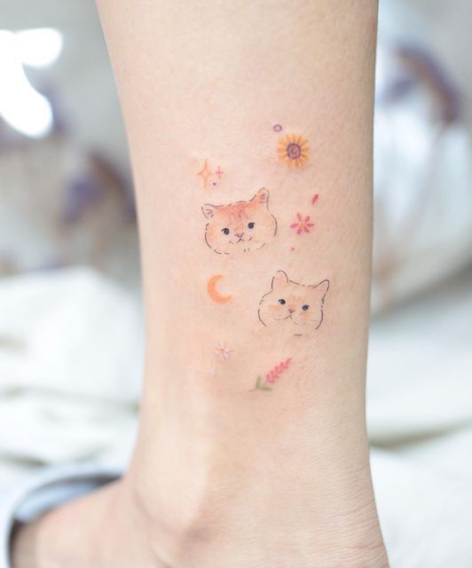 ý tưởng tattoo mặt 2 chú mèo mini cute